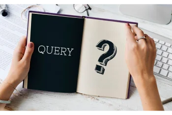 Person holding an open book displaying the word "QUERY" and a large question mark.